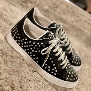 Black leather studded sneakers
